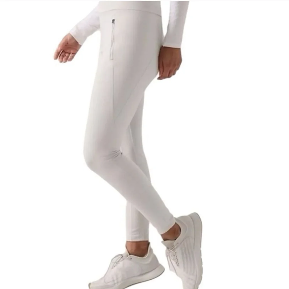 Athleta peak hybrid Fleece tight Size Small
